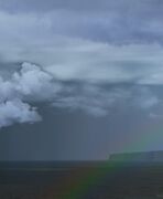Rainbow over volcanic beach, Iceland. FlightGear 2020.3.